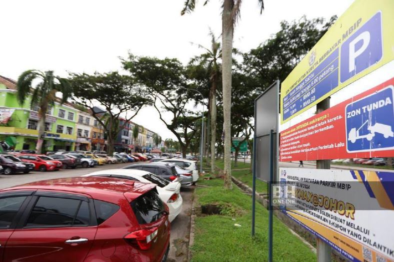 Parkir awam dibolot pekerja Malaysia di Singapura 15 jam sehari