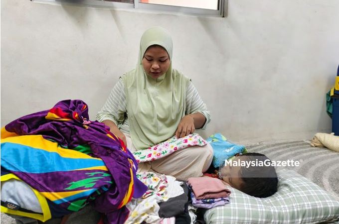 Ibu tunggal rayu beri upah lipat baju untuk sara anak hidap `hidrosefalus’